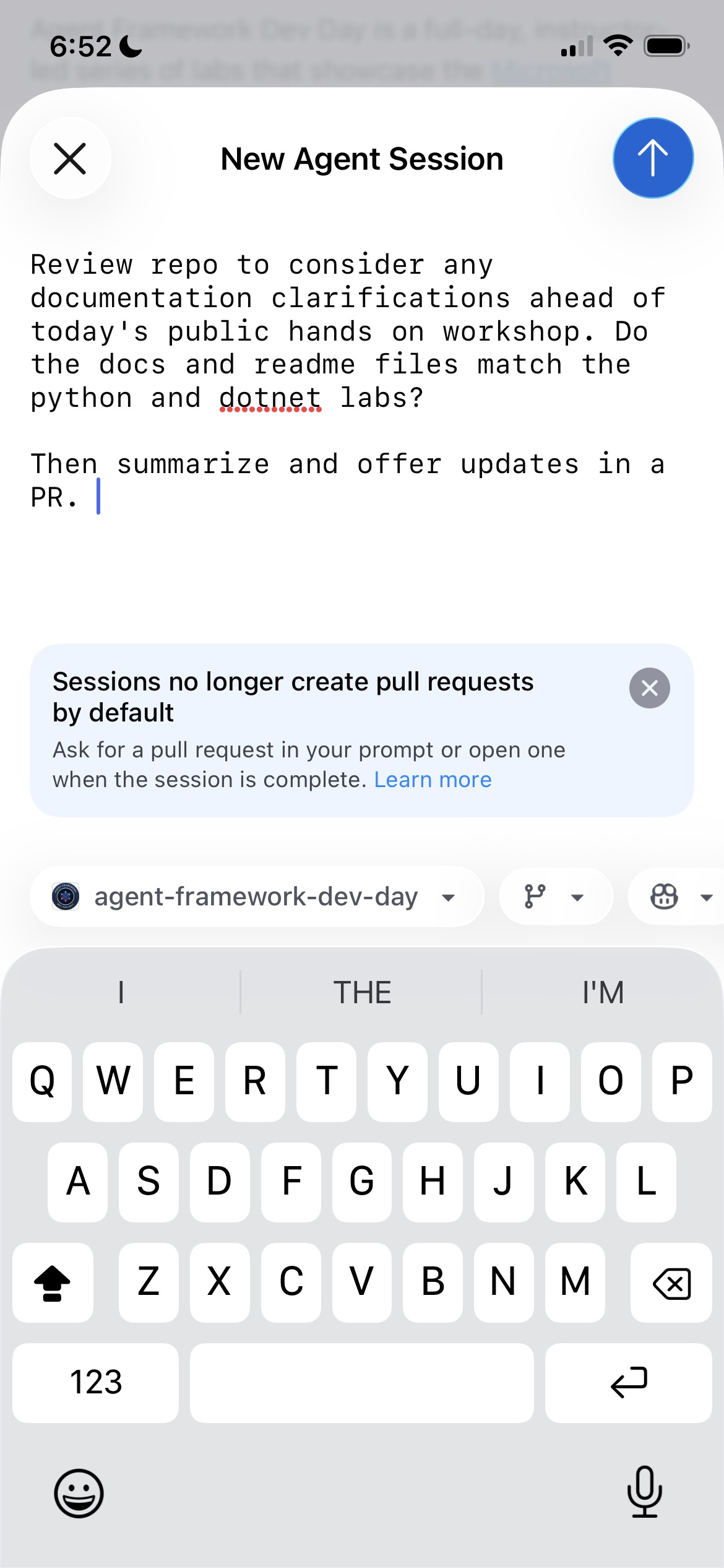 Small group at the conference table reviewing repository and documentation details before the workshop started