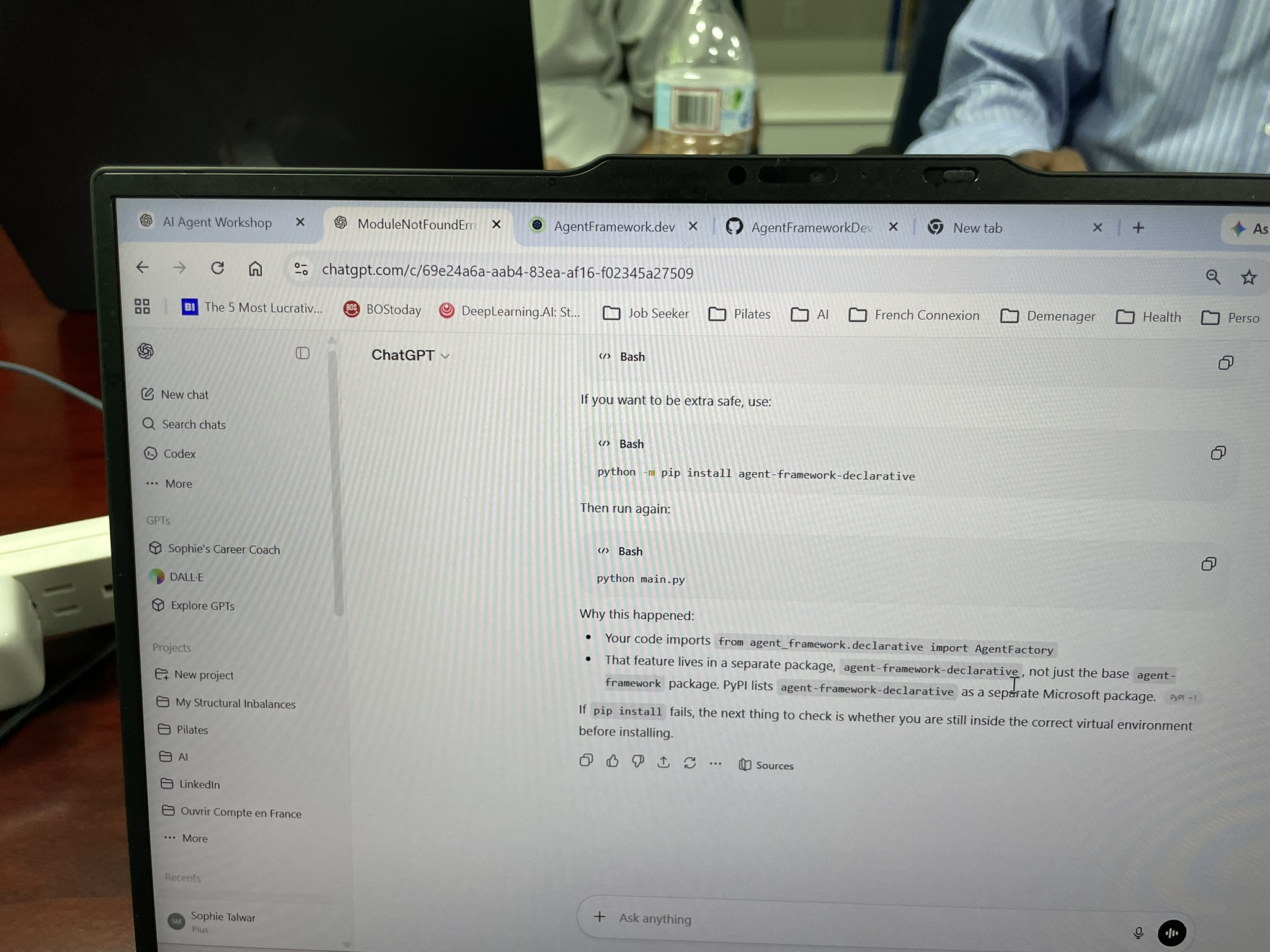 Laptop screen showing guidance for fixing a Python package installation issue during the workshop