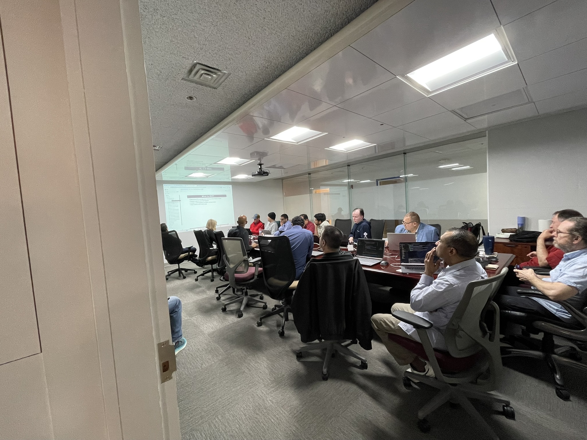 Wide view from the doorway showing the April 2026 workshop in progress